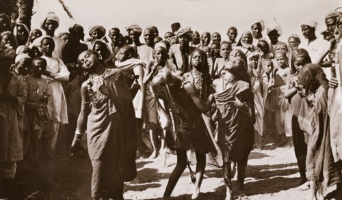 Sudanese girls perform a traditional dance. A group of Sudanese girls perform a traditional dance