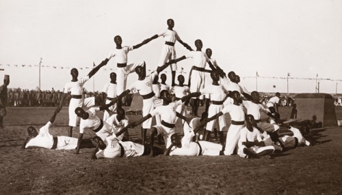 Sudanese military cadets. A group of young Sudanese army cadets, dressed in white uniforms, form a