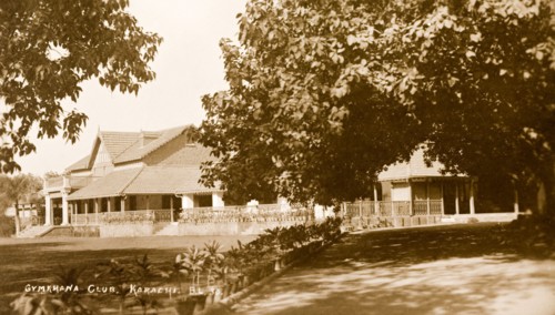 Karachi Gymkhana Club. View across the orderly front lawn of the Karachi Gymkhana Club, a low,