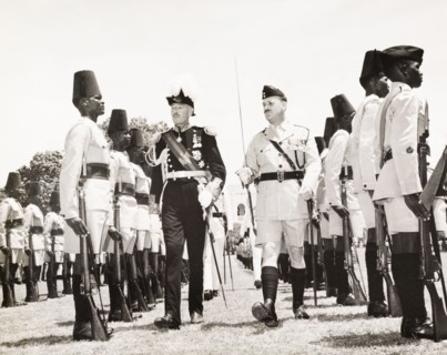 Sir Richard Turnball inspects the Tanganyika Rifles. Sir Richard Turnbull (1909-1998), the last