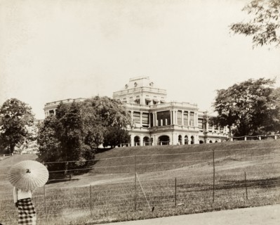Government House, Singapore. Government House stands on a rise in landscaped gardens behind a wire