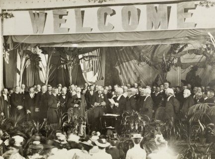 Sir Arthur Lawley is sworn in as Governor. Sir Arthur Lawley (centre) holds a bible in both hands