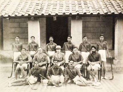 Portrait of an Indian police hockey team. Group portrait of an Indian police hockey team. Three