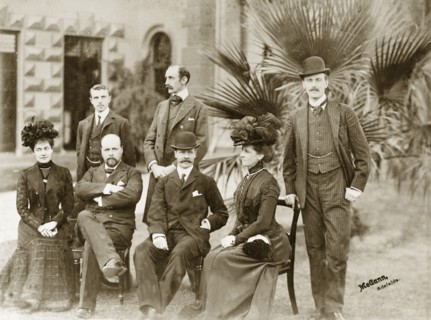 The Lawleys visit the Tennysons. Group portrait of Sir Arthur and Lady Annie Lawley (seated third