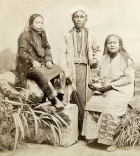 A 'Malay Hadjee' and family. Studio portrait of a 'Malay Hadjee' and family. The man wears