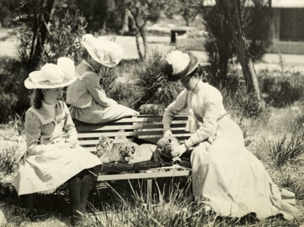 Playing with tiger cubs at Perth Zoo. Annie Lawley (right) and her daughters, Ursula (left) and