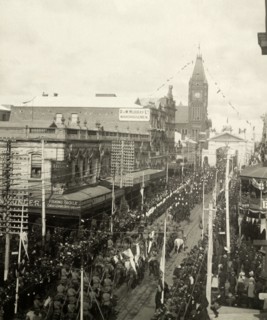 Royal welcome procession, Perth. Crowds line the streets as several military regiments file past