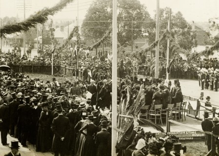Laying the foundation stone for a new museum. A crowd gathers to watch the Duke of Cornwall and