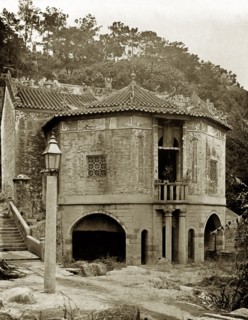 A Chinese Joss house in Hong Kong. A large apse, supported by arches, projects from the rear of a
