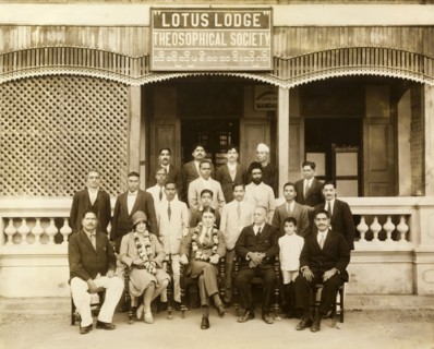 The Theosophical Society in Mandalay. A group of suited Burmese men assemble for a photograph with