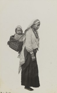 Portrait of a Nepalese woman and baby. Portrait of a Nepalese woman and baby. The women wears