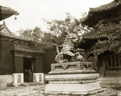Statue of a lion at a Buddhist temple in China. An ornamental statue of a lion stands in the