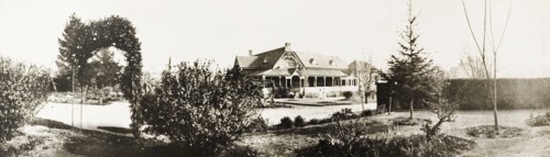 Government House, Pretoria. Exterior view across the formal gardens to the colonial-style