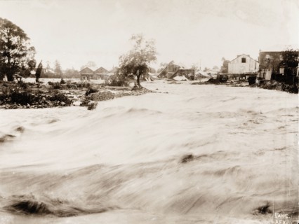 Flooding in Bloemfontein. A burst dam resulting from freak rainfall causes a flood to rampage down
