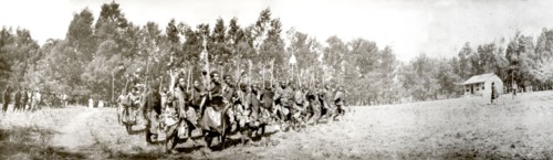 Swazi warriors perform a war dance. Swazi warriors perform a war dance for visiting British