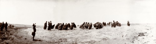 African women threshing corn. A group of African women thresh corn by hand. South Africa, circa