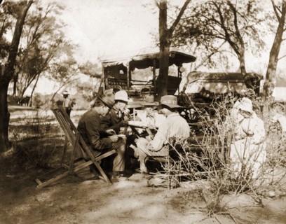 Captain Lawley stops for lunch. Captain Arthur Lawley (1860-1932) (front right) takes lunch with