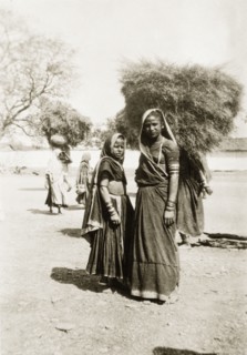 Two Indian women in Udaipur. Portrait of two young Indian women, dressed in traditional saris that