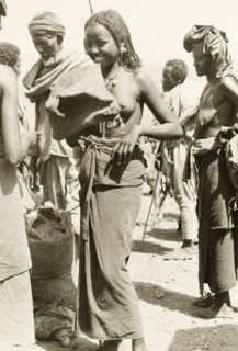 A young Eritrean woman. A young Eritrean woman is pictured during a moment of amusement at an