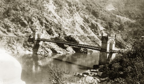 Victoria Bridge in Mandi, India. View of Victoria Bridge over the Beas River at Mandi. The