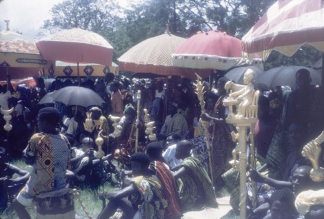 Linguists' staffs at the Ngmayem festival. Several 'okyeames' (linguists) sit beneath ceremonial