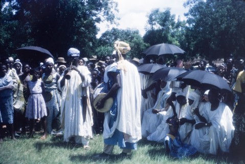 Zongo musicians at a Ngmayem festival. Crowds at an annual Ngmayem harvest festival are entertained