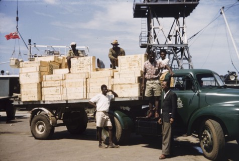 School books arrive at Takoradi. Crates full of school library books arrive on the back of an open