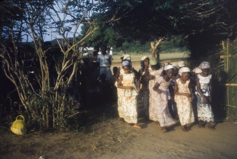 Girls dance in a nativity play. A group of girls perform a dance routine as part of a nativity play