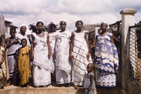 Celebrating the third anniversary of Ghanaian independence. A group of traditionally dressed