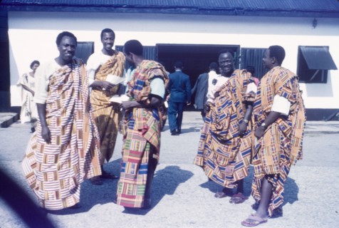 Ghanaian men wearing kente cloth. A group of Ghanaian men wear traditional kente cloth at a