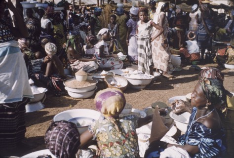 Market in Tamale, Ghana. Women sell rice and other foodstuffs at an outdoor market in Tamale.