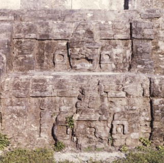 Ancient stone carving at Altun Ha. An ancient stone carving, inscribed into the walls of a temple