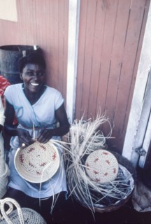Weaving baskets, Jamaica. An official publicity shot for the Jamaican Tourist Board features a