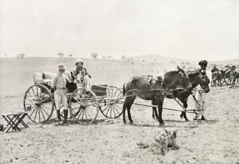 A Uganda Railways Chief Engineer. A Uganda Railways Chief Engineer stands beside a horse-drawn