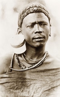 Portrait of a Maasai man. Head and shoulders portrait of a Maasai man, wearing traditional