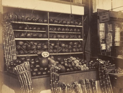 Fruit stall at a Cuban market. A fruit stall at a Cuban market sells melons, pineapples and bundles