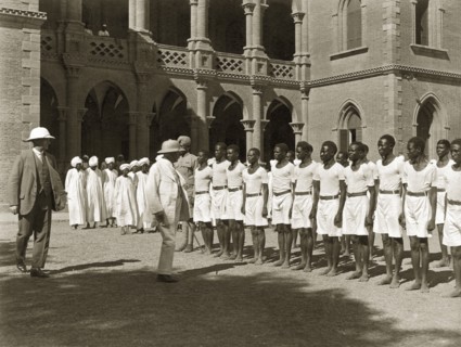 Rudolf von Slatin visits Gordon College. Sir Rudolf Carl von Slatin inspects a line of uniformed