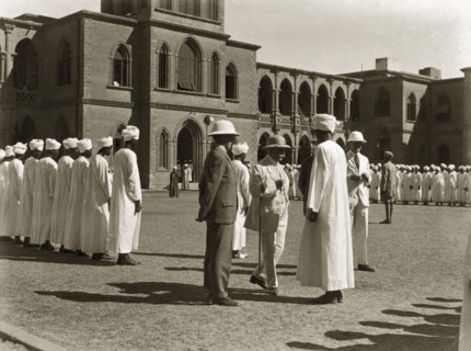 Rudolf von Slatin visits Gordon College. Sir Rudolf Carl von Slatin inspects a line of African men