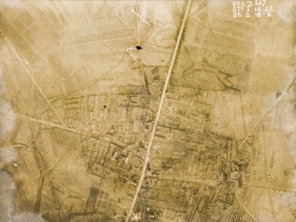 Aerial view of a bomb-damaged village. One of a series of British aerial reconnaissance photographs
