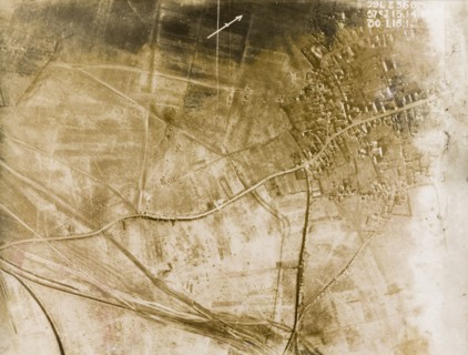 Aerial view of a bomb-damaged village. One of a series of British aerial reconnaissance photographs