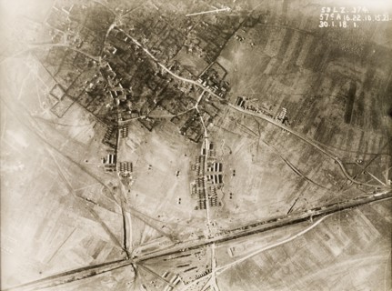 British military camp in a ruined village. One of a series of British aerial reconnaissance