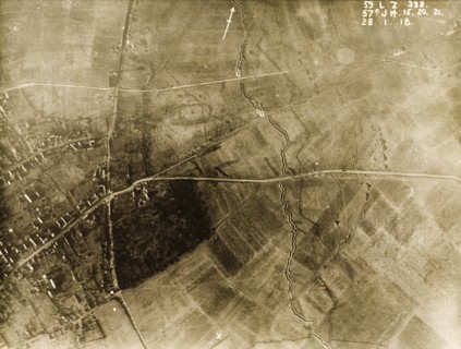Ruined village behind a British defence trench. One of a series of British aerial reconnaissance