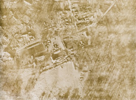 Aerial view of a bomb-damaged village. One of a series of British aerial reconnaissance photographs