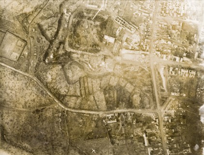 Aerial view of a bomb-damaged village. One of a series of British aerial reconnaissance photographs