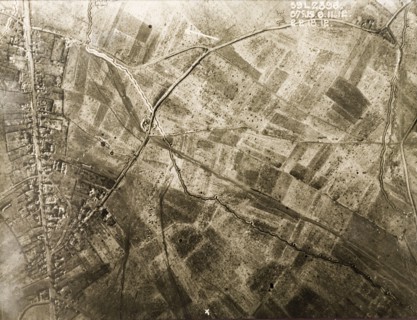 Aerial view of a bomb-damaged village. One of a series of British aerial reconnaissance photographs
