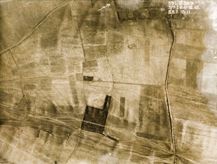 Transport tracks and bomb craters. One of a series of British aerial reconnaissance photographs