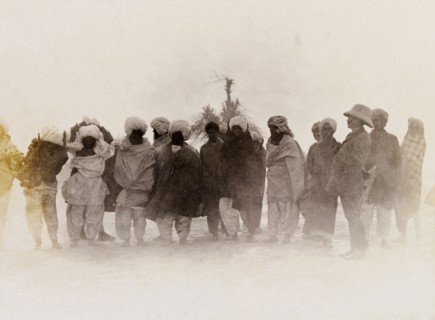 A line of 'zamindars'. Sir Henry Staveley Lawrence, Collector of Karachi, stands beside a line of