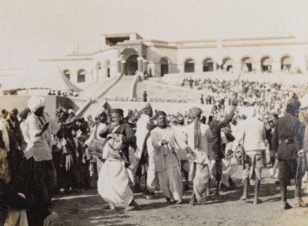 Musicians and dancers in Sukkur. Musicians and dancers perform to a crowd of spectators at an