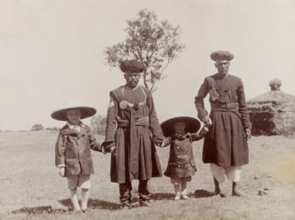 The Lawrence boys with Indian attendants. George (b.1899) and Henry (b.1902), the sons of Phyllis