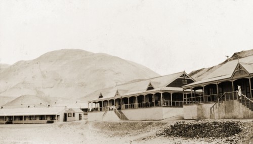 Colonial buildings on San Lorenzo Island . A number of single-storey, colonial-style buildings with